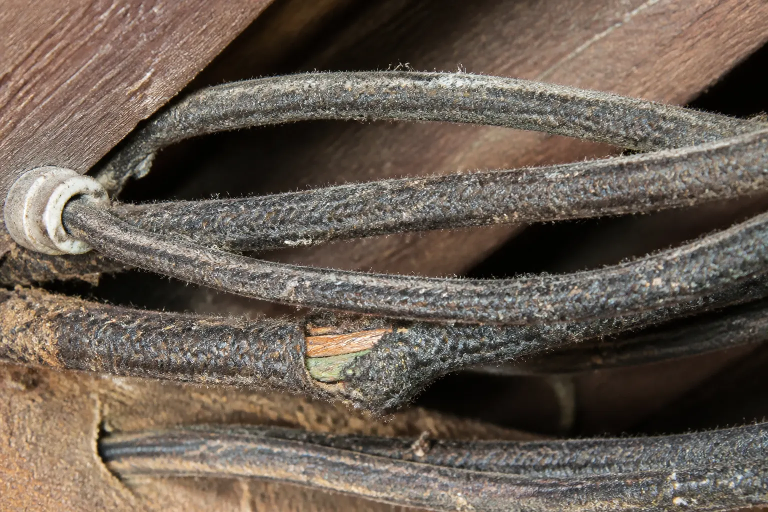 Old cloth-insulated electrical wiring in a Tampa attic